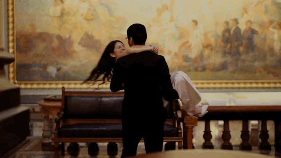 Iowa capitol elopement - couple spinning around in a circle