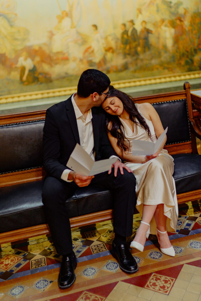 Iowa capitol elopement - couple reading vows