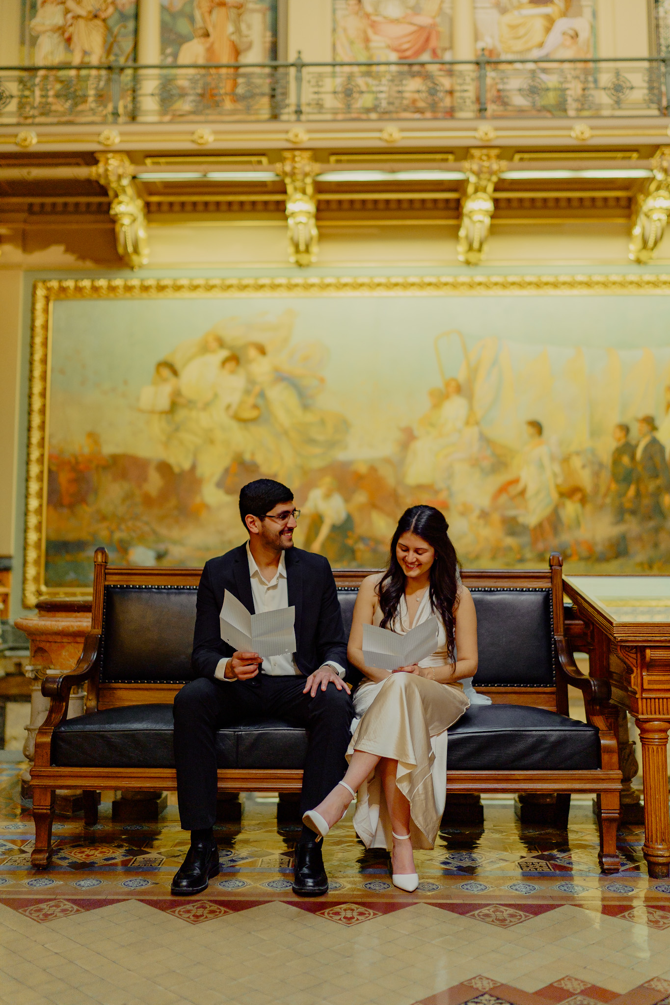 Iowa capitol elopement - couple reading vows