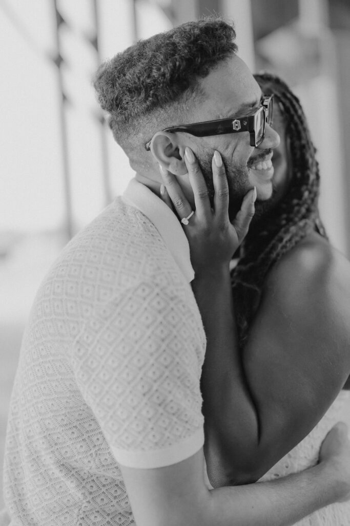 Romantic Powell Gardens proposal in Missouri couple embracing black and white image