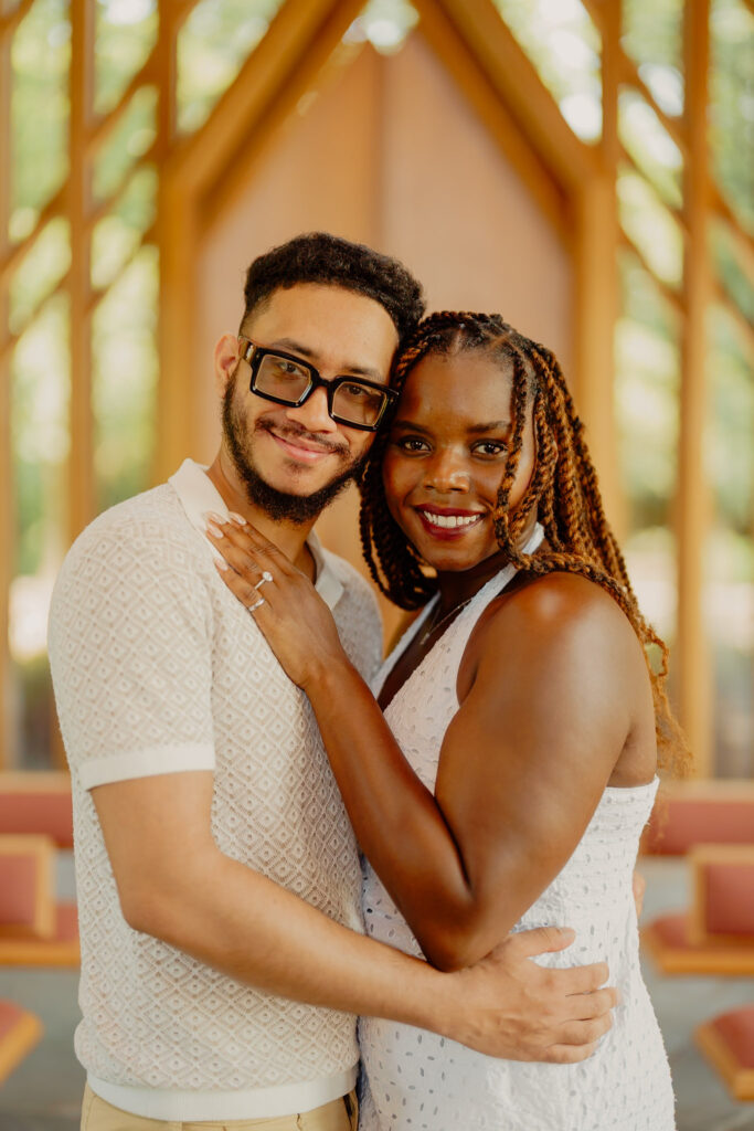 Romantic Powell Gardens proposal in Missouri couple in embrace and smiling