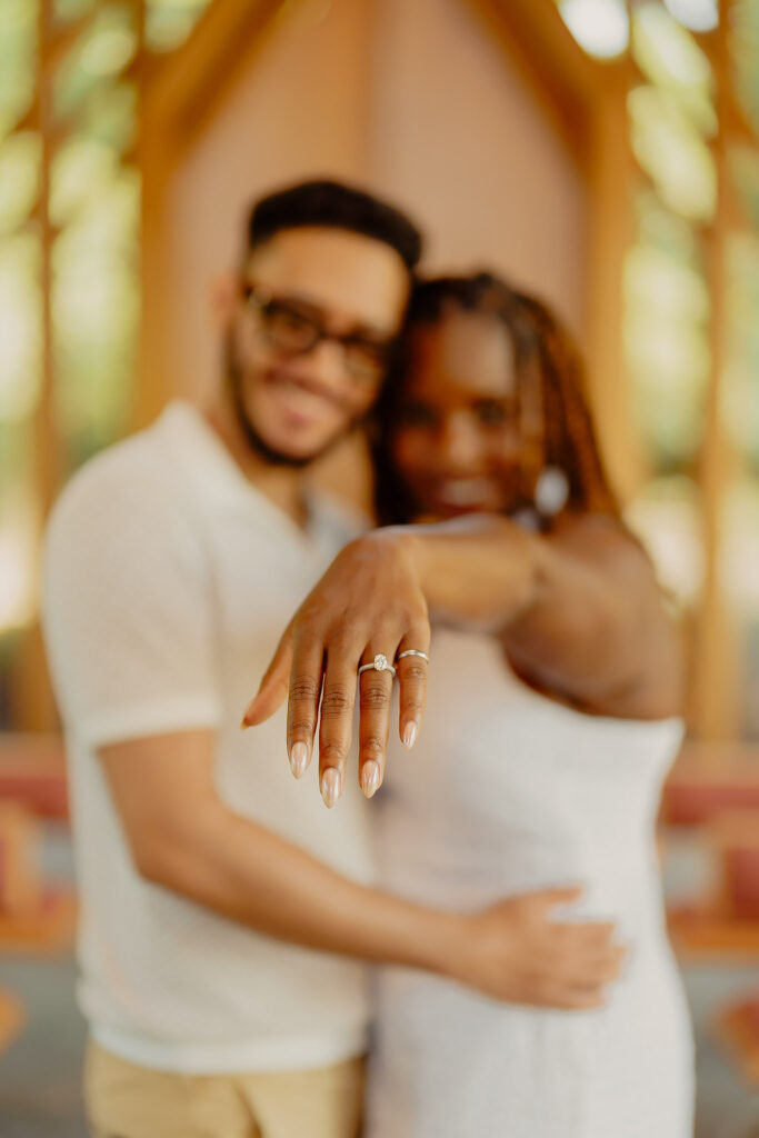 Romantic Powell Gardens proposal in Missouri woman showing off ring