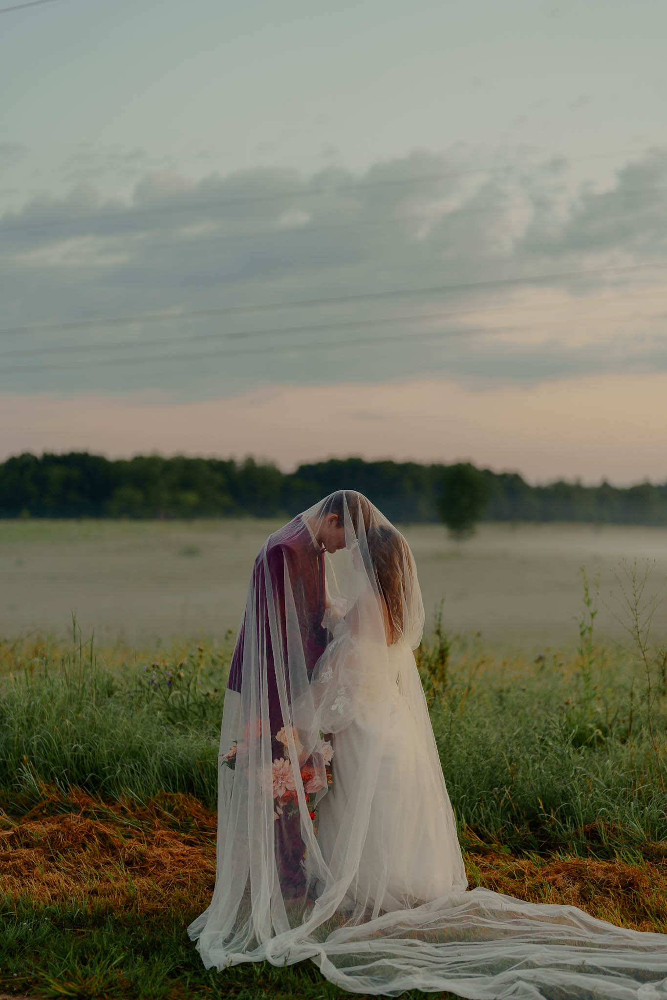 Pride and prejudice inspired elopement couples under veil