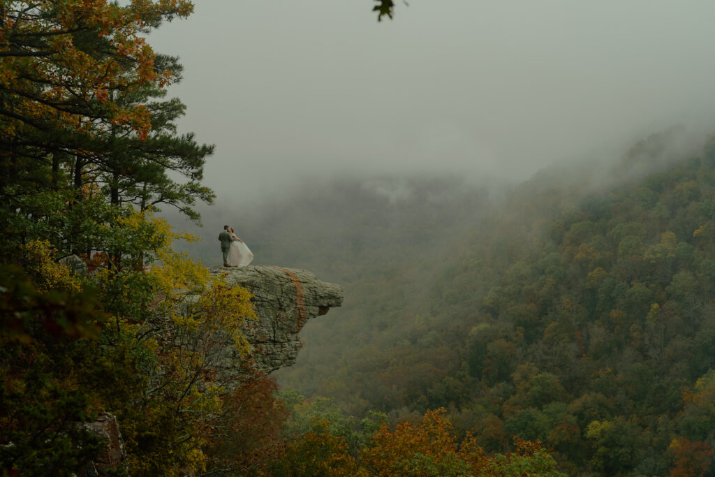 eloping couple on ledge at Whitaker point